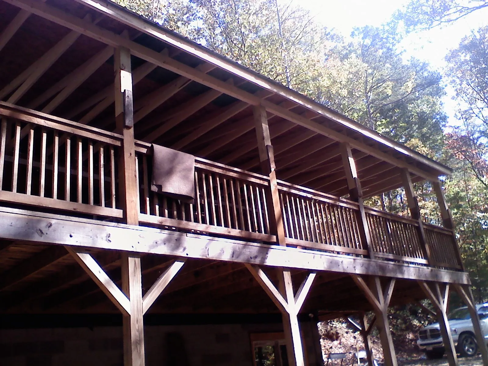 Timber framing under a new elevated porch and deck — Roof Leak Repair in Redfield by Roofing Brothers